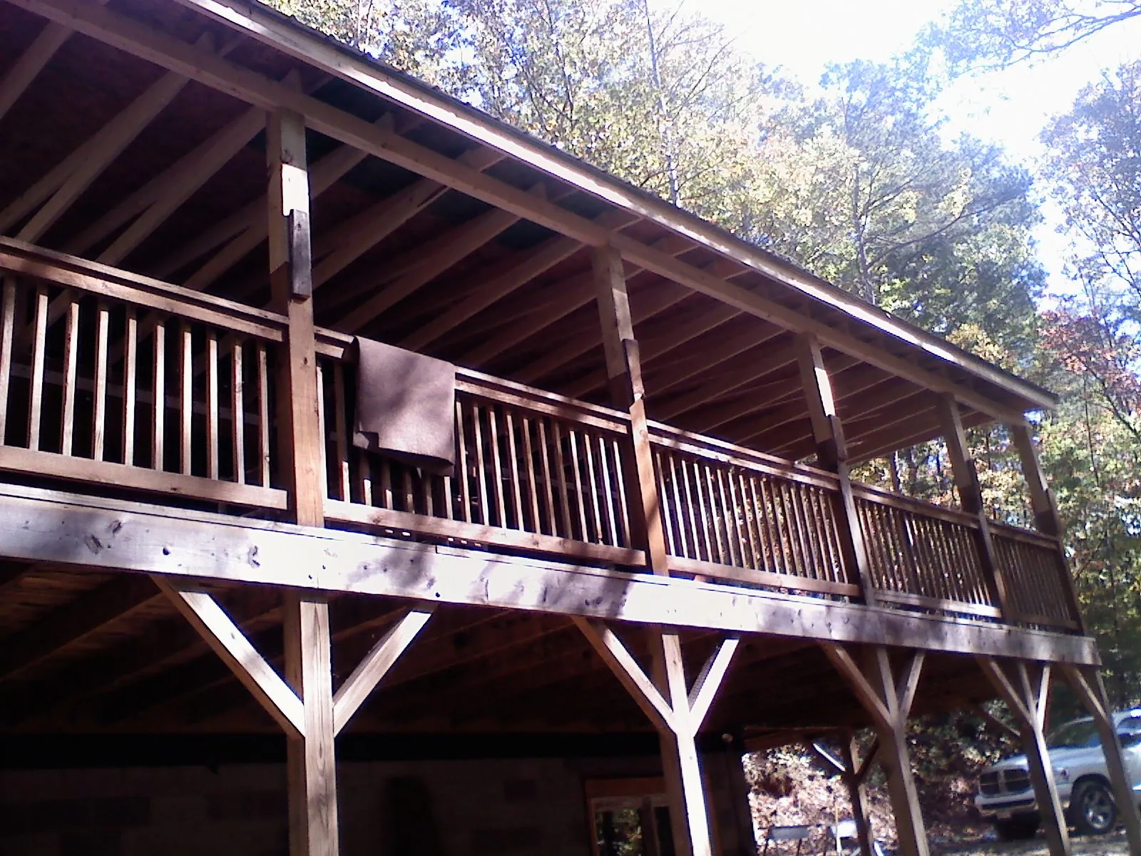 Timber framing under a new elevated porch and deck — Roof Leak Repair in Crozet by Roofing Brothers